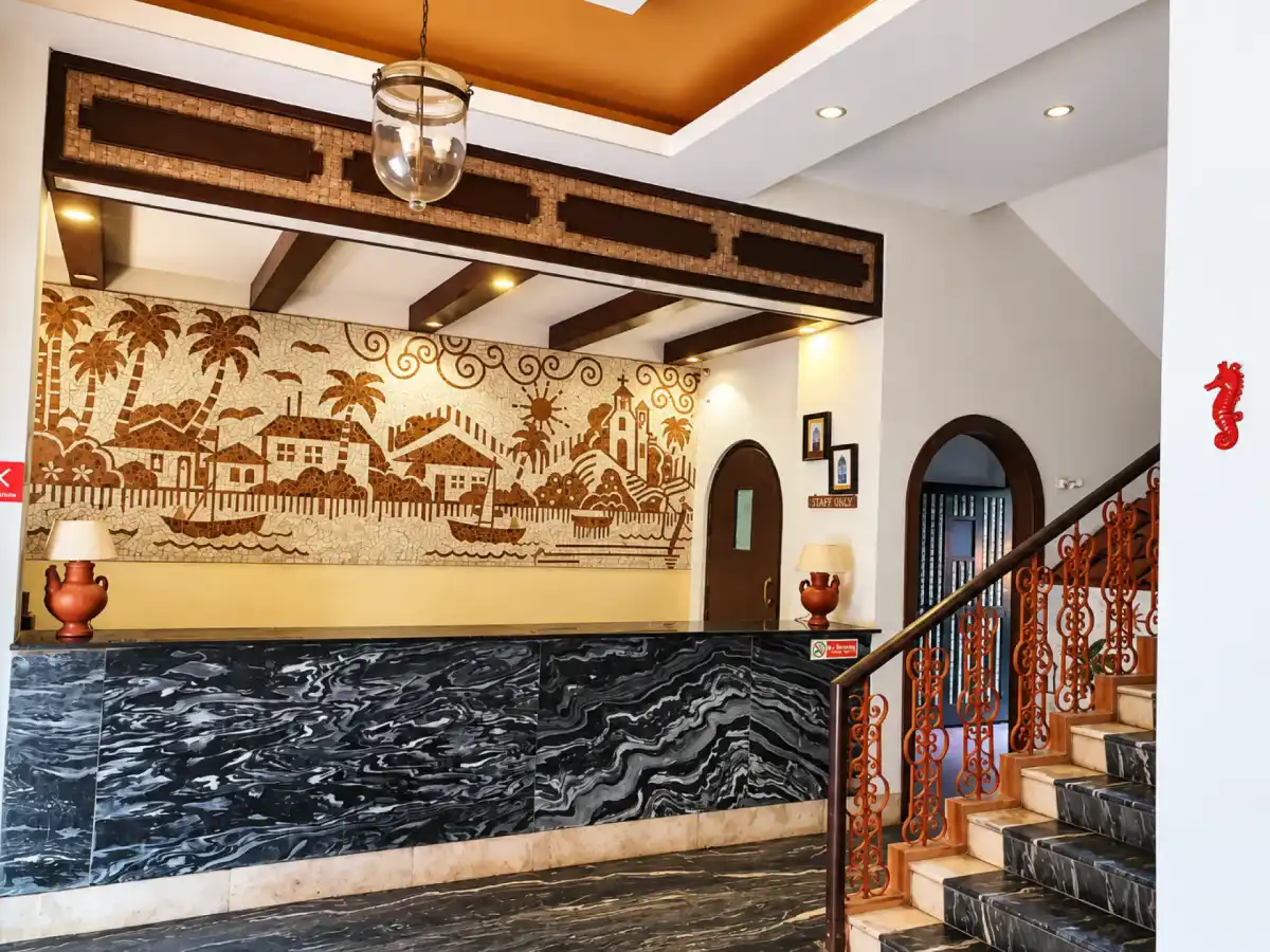 Mayfair Hotel reception with a mural inspired by Goa